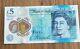 Rare five pound note. Low serial number. Polymer bank note. AA01 013827